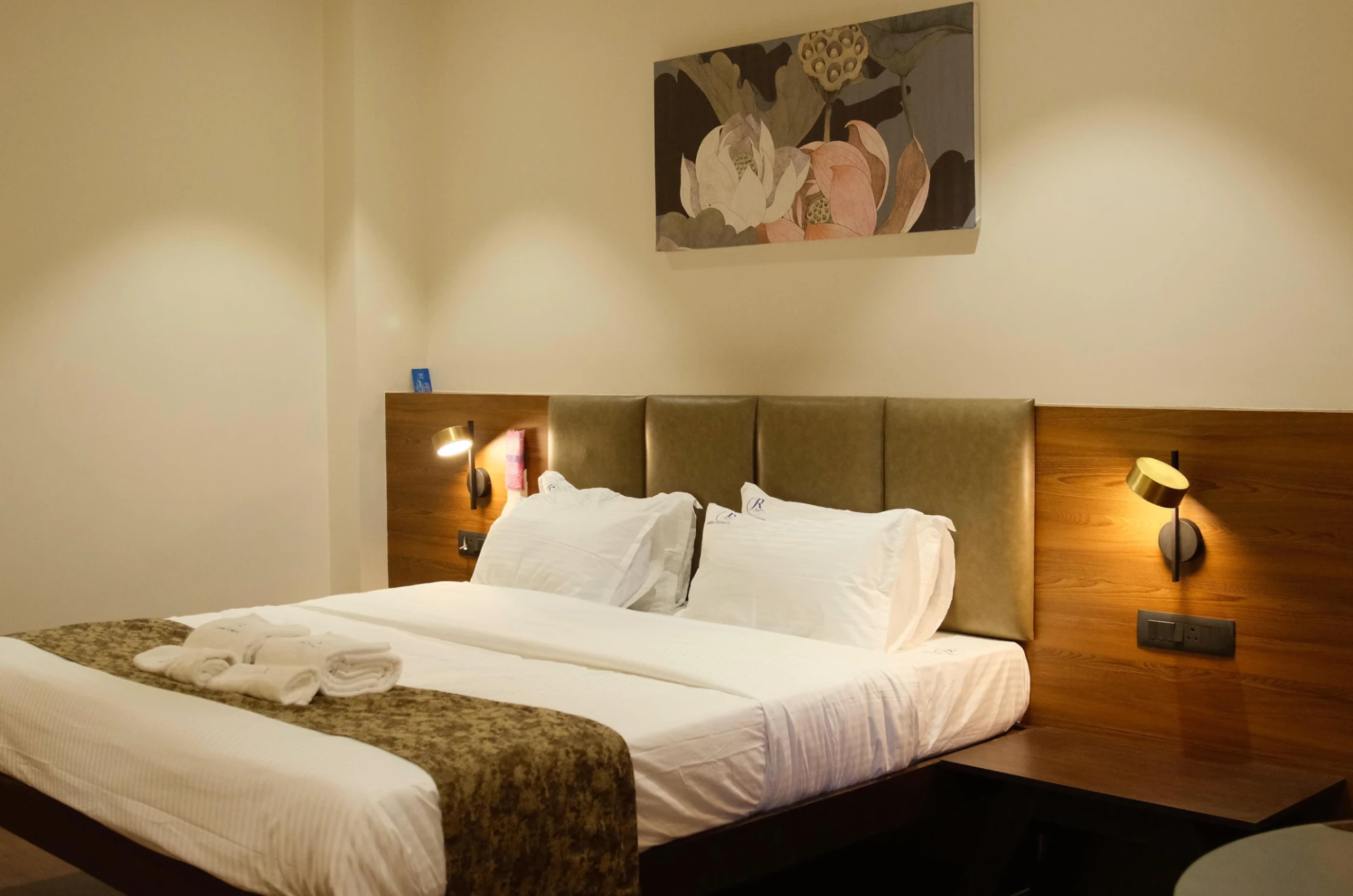 Deluxe room with king bed and warm lighting